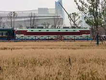 调车场区域的韶山3型电力机车8050号机车，查定曾配属成都局集团重庆机务段。