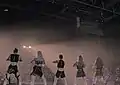 (G)I-dle in all-black outfits for the theme [HEROiNE: Cliché] Just Me (G)I-dle.