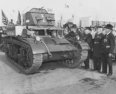 Army veterans inspect a M1 Combat Car at the 1939 World's Fair in New York