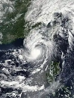 百里嘉於9月11日早上增強為熱帶風暴，鞏固中心環流。