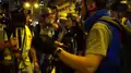 有攝影師與警員爭論