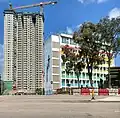 興建中之青荷樓與天主教郭怡雅神父紀念學校（2023年2月）