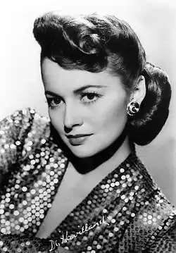 Promotional photograph of Olivia de Havilland looking to the left