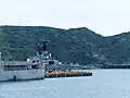 2013年中正軍港營區開放活動，由12號碼頭濟陽級鳳陽號巡防艦（FFG-933）艦尾右舷，東望11號碼頭巡防艦淮陽（FFG-937）與10號碼頭武昌軍艦（PFG-1207）艦尾。右側遠方是高雄號兩棲指揮艦（LCC-1），山上廟宇是北方澳進安宮