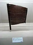 江西省靖安县李洲坳春秋墓出土竹扇（复制品）