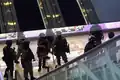 部分防暴警察蒙面，不能辨別